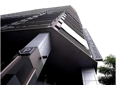 a building with a sign on the side of it at D'CASA Fairlane 