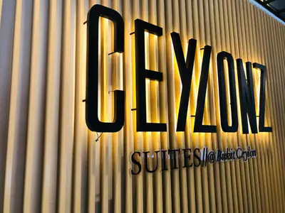 a sign on a wall with the word fire on it at Ceylonz Suites by ROOMY in Kuala Lumpur