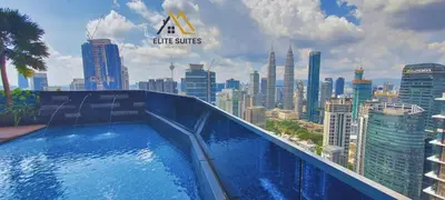 a swimming pool on top of a city skyline at Eaton KLCC Suites By Elite in Kuala Lumpur