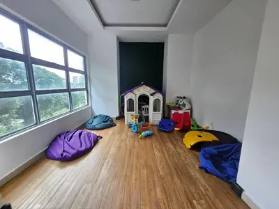 a room with several play tents on the floor at Blue Sky Apartment in Kuala Lumpur