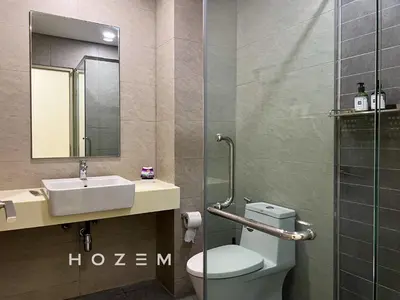 a bathroom with a toilet and a sink and a mirror at SBR2B Hozem KL1305 Apartment Old Klang Road in Kuala Lumpur