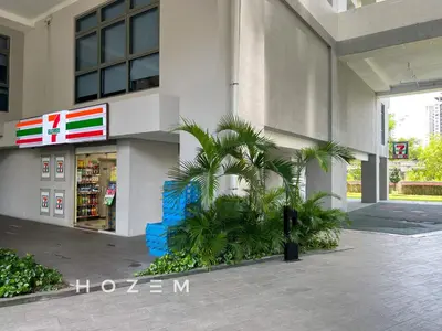 a store with a palm tree in front of a building at SBR2B Hozem KL1305 Apartment Old Klang Road in Kuala Lumpur