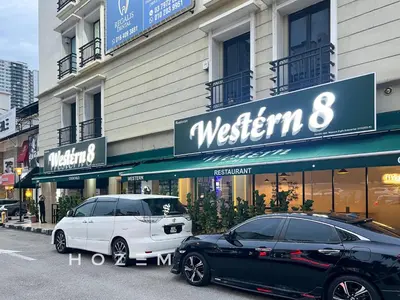 two cars parked in front of a building at SBR2B Hozem KL1305 Apartment Old Klang Road in Kuala Lumpur