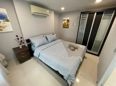 a small bedroom with a bed and a window at Dalamanda 3Pax Sunway Velocity Balcony CItyView in Kuala Lumpur