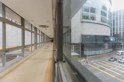 a large building with a view of a street at Banyan Signatures Pavilion Kuala Lumpur in Kuala Lumpur
