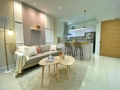 a living room with a couch and a table at Lily and Loft - Camellia @ Bangsar Kuala Lumpur in Kuala Lumpur