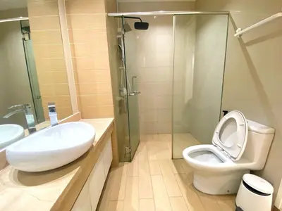 a bathroom with a toilet and a sink and a shower at Lily and Loft - Camellia @ Bangsar Kuala Lumpur in Kuala Lumpur