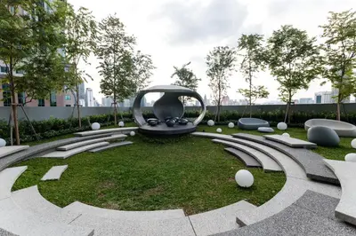 a park with a large sculpture in the grass at Scarletz KLCC Studio Suites 4 pax Luxury Modern Style WiFi 100Mbps in Kuala Lumpur
