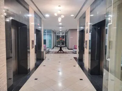 a hallway of a building with a painting on the wall at The Orion @Next to IJN 3 Bedroom Unit in Kuala Lumpur