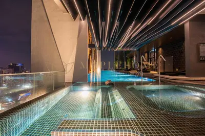a swimming pool on the top of a building at Scarletz Premier Suites Kuala Lumpur in Kuala Lumpur
