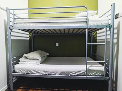a bunk bed in a room with a bunk bedscribed at The Manor by Mingle - Poolside Access Next Door in Kuala Lumpur