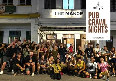 a group of people posing for a picture in front of a building at The Manor by Mingle - Poolside Access Next Door in Kuala Lumpur