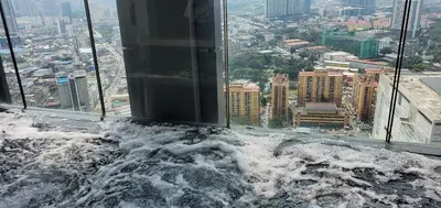 a view from the top of a building with snow on the floor at Lucentia Lalaport BBCC, Stuning Infinity Pool in Kuala Lumpur