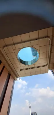 a swimming pool in the ceiling of a building at Lucentia Lalaport BBCC, Stuning Infinity Pool in Kuala Lumpur