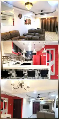a living room with a couch and a kitchen at Apartment Low Cost 2 Bilik Asnor Homestay KL in Kuala Lumpur