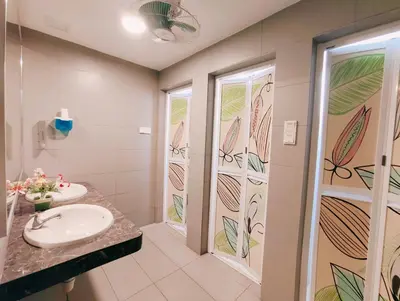 a bathroom with a sink and a shower at SCC Hotel Chinatown in Kuala Lumpur