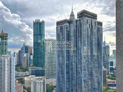 a group of tall buildings in a city at Scarletz Suites by Edenzpace @ KLCC Area in Kuala Lumpur