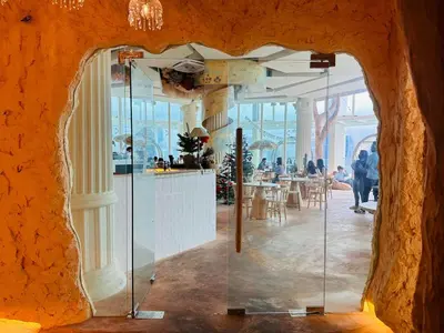 a room with a glass door in a building at Regalia Modern Studio in Kuala Lumpur