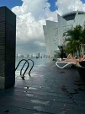 a view of the ocean with buildings in the background at Regalia Modern Studio in Kuala Lumpur