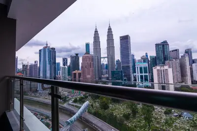 a view of a city skyline with tall buildings at Legasi @ Kampung Bharu in Kuala Lumpur