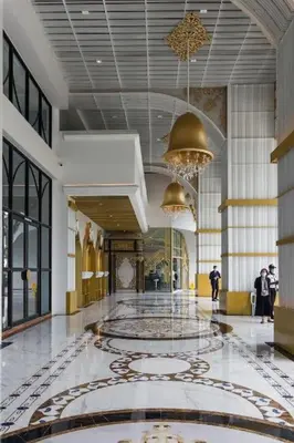 a large lobby with a chandelier and a large hall at Diamond Home Comfort @ Arte Mont Kiara in Kuala Lumpur