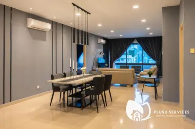 a dining room with a table and chairs at Angkasa Impian 1 @ Bukit Bintang in Kuala Lumpur