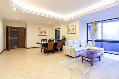 a living room with a couch and a table at Angkasa Impian 1 @ Bukit Bintang in Kuala Lumpur