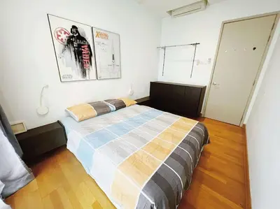 a bedroom with a large bed in a room at [PROMO]Connected train 2 Bedroom (ABOVE MALL)15 in Kuala Lumpur