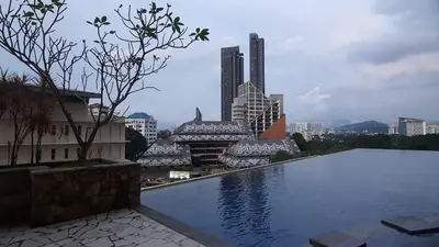 a view of a city skyline with a swimming pool at Homestay Jalan Tun Razak walking distance IJN, HKL, MRT Raja Uda, PUSRAWI, KPJ, PERKESO, Istana Budaya Гостевой дом Куала-Лумпур โฮมสเตย์ กัวลาลัมเปอร์ in Kuala Lumpur