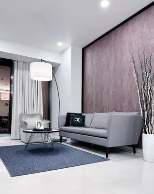 a living room with a couch and a table at Tropicana The Residence suites by VV Homestay KLCC in Kuala Lumpur