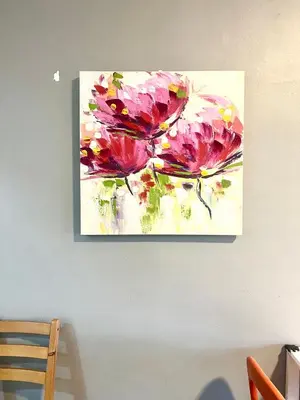 a painting of pink flowers on a wall at Superior Maya Kuala Lumpur in Kuala Lumpur