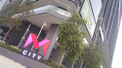 a building with a x city sign on it at MCity Ampang, KL in Kuala Lumpur