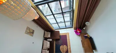 an overhead view of a living room with a window at MCity Ampang, KL in Kuala Lumpur