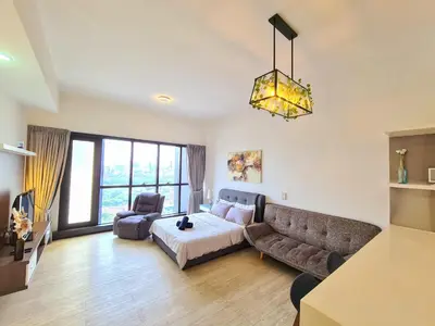 a large living room with a couch at M city service suite KLCC in Kuala Lumpur