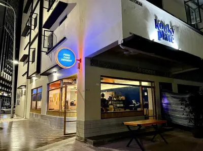 a store front with a bench in front of it at #23 KL towel view twin bed suites @ infinity pool in Kuala Lumpur