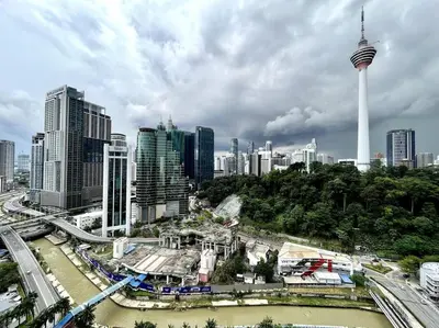 a view of a city with the space needle at #23 KL towel view twin bed suites @ infinity pool in Kuala Lumpur