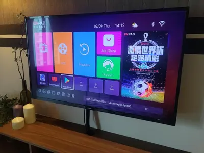 a flat screen tv sitting on top of a table at Arcoris Soho 1-4PAX COZY HOME in Kuala Lumpur