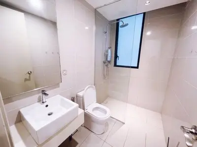 a bathroom with a sink and a toilet and a window at [PROMO]Connected train 2 Bedroom ABOVE MALL (22) in Kuala Lumpur