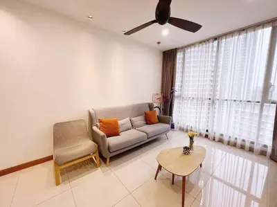 a living room with a couch and a table at [PROMO]Connected train 2 Bedroom ABOVE MALL (22) in Kuala Lumpur