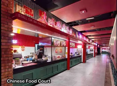 a fast food restaurant with a chef preparing food at MITEC Publika 500Mbp Wi-fi Studio Mont Kiara Hartamas in Kuala Lumpur