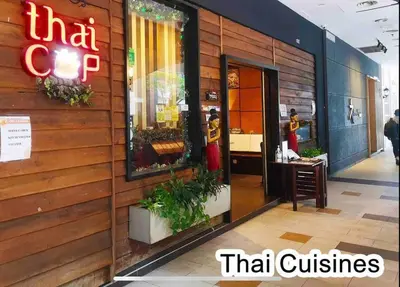 a store front of a restaurant with a sign on the wall at MITEC Publika 500Mbp Wi-fi Studio Mont Kiara Hartamas in Kuala Lumpur