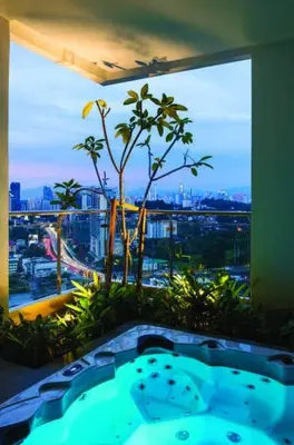 a bath tub in a room with a large window at Mid Valley - Vivo Residence Center Of KL 6-8Pax in Kuala Lumpur