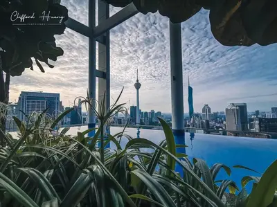 a view of a city skyline from a building at The Colony By Infinitum Best Pool View KLCC TRX Merdeka 118 KL Tower in Kuala Lumpur
