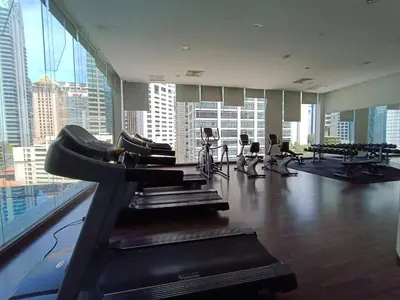 a gym with treadmills and machines in a building at RM020 Bukit Bintang 118 Tower Balcony View in Kuala Lumpur