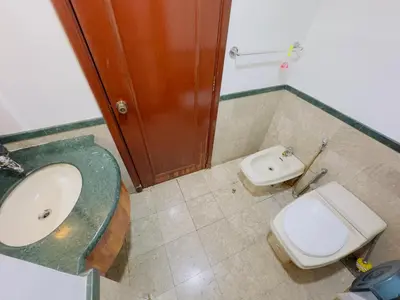 a bathroom with a sink and a toilet at Times Square East privite service Apartment in Kuala Lumpur