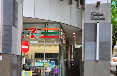 a store with signs on the side of a building at 1-6px Bukit Bintang 1min walk to Lot10 Pavilion in Kuala Lumpur