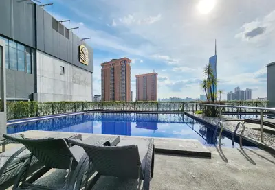 a swimming pool on the roof of a building at 1-6px Bukit Bintang 1min walk to Lot10 Pavilion in Kuala Lumpur