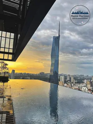 a view of a tall building on top of a city at Premium Suites by Home Horizon at Lucentia Residence in Kuala Lumpur