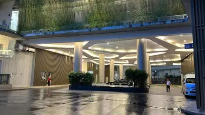 a large building with columns and lights in it at The Robertson Residence Bukit Bintang 20F in Kuala Lumpur