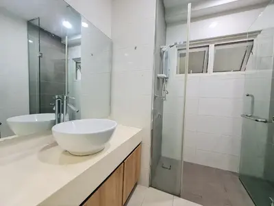 a white bathroom with a sink and a shower at Crest Residence Klcc Bukit Bintang by Sarah's Lodge in Kuala Lumpur